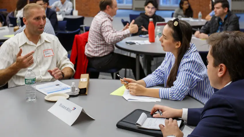 A professional from Harbourvest talking to students.