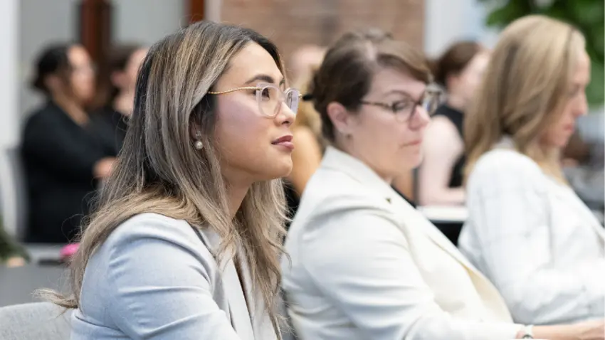 Attendees listen to speakers at the Bentley-Gallup Event in Washington, DC