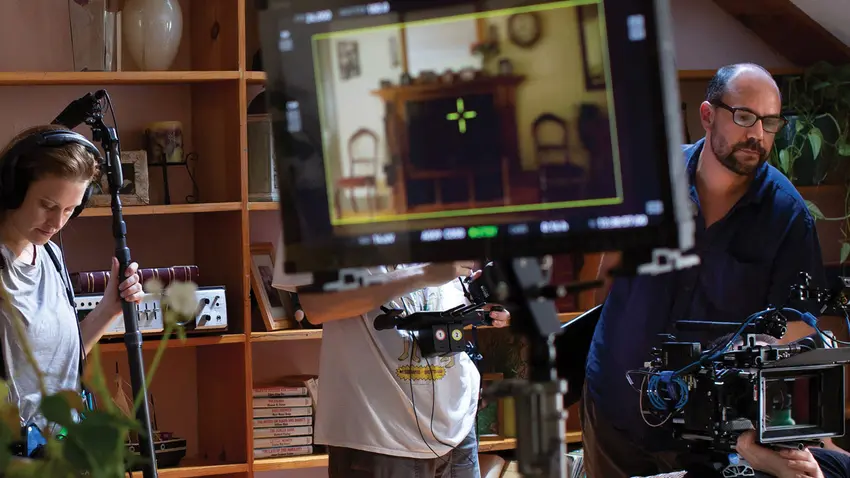 people setting up electronic devices