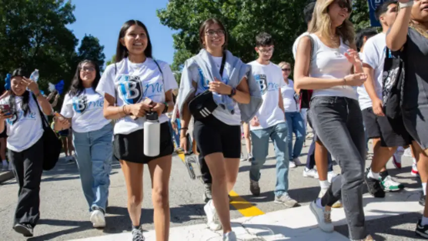 Bentley students walking through campus