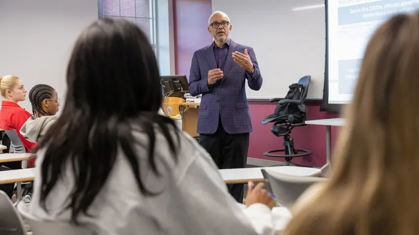 Bentley President E. LaBrent Chrite teaching first-year students in a classroom during Falcon Discovery Seminar