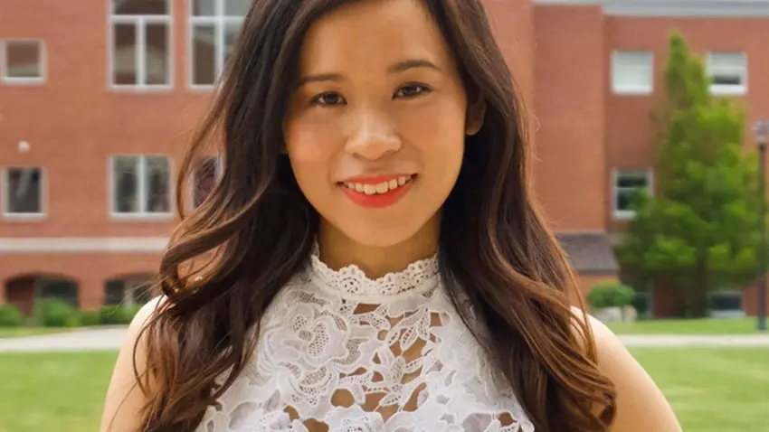 natalie_nguyen msba alumni standing in front of Bentley library