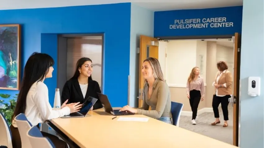 Students outside of Pulsifer Career Development Center at Bentley