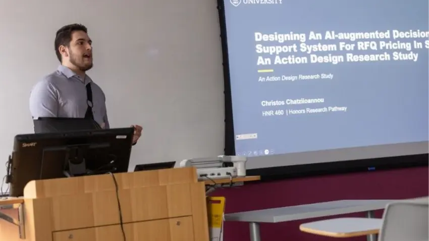 Bentley student Christos Chatziioannou ’27 present AI research at undergraduate research day