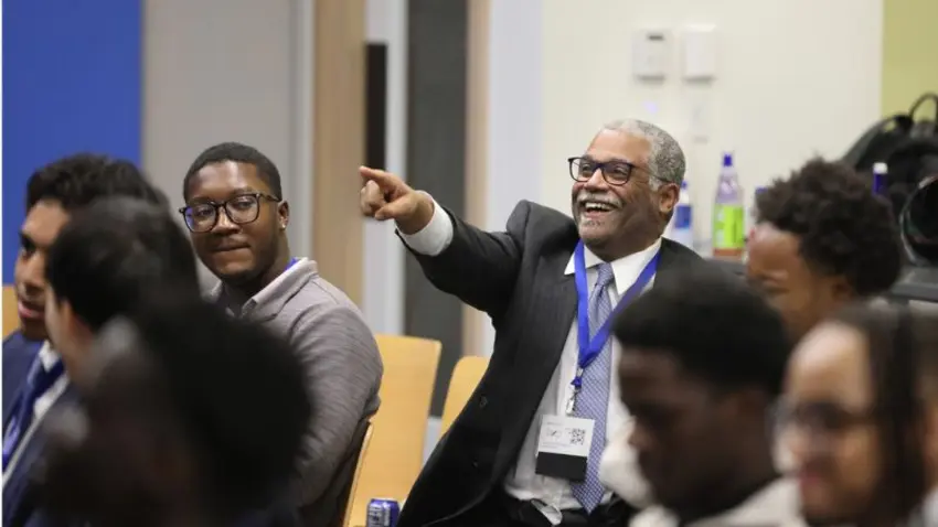 Attendees mingling at the Bentley Mankind Movement networking conference