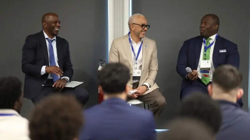 Three panelists speaking at the Bentley Mankind Movement Networking Conference