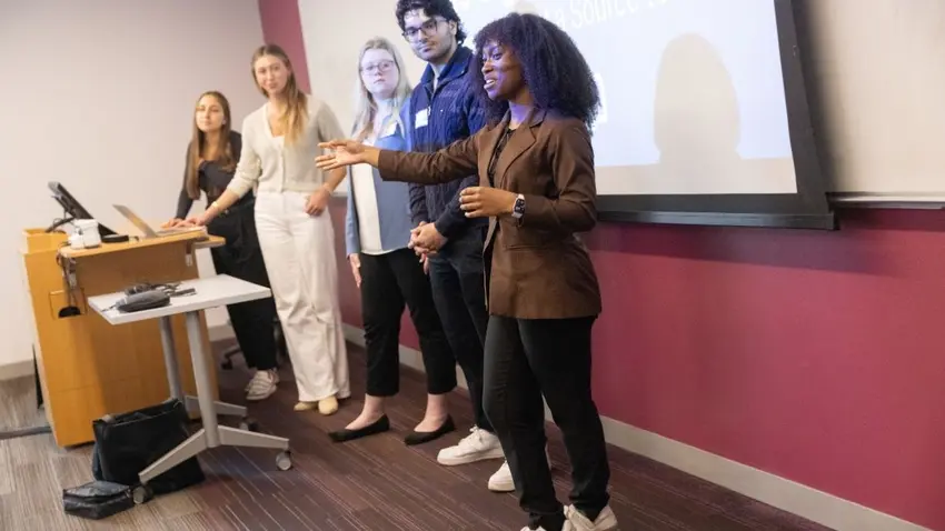 A group of five Bentley students presents at Undergraduate Research Day 2026