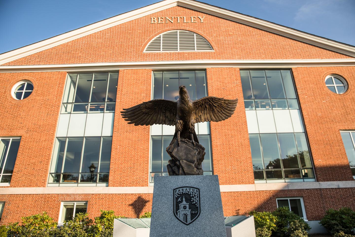 Photo of Bentley library with Falcon statue in foreground