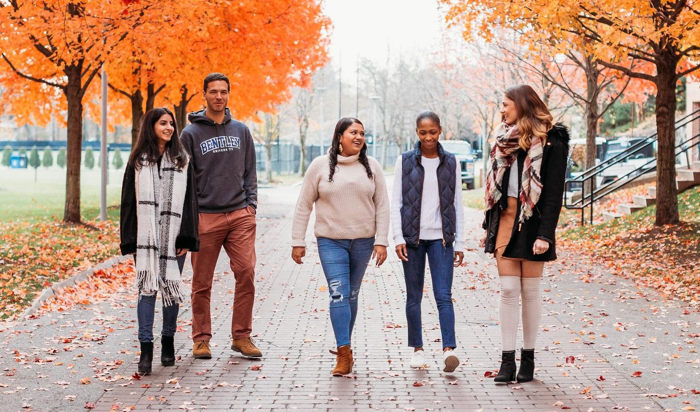 Students stroll together on Bentley campus