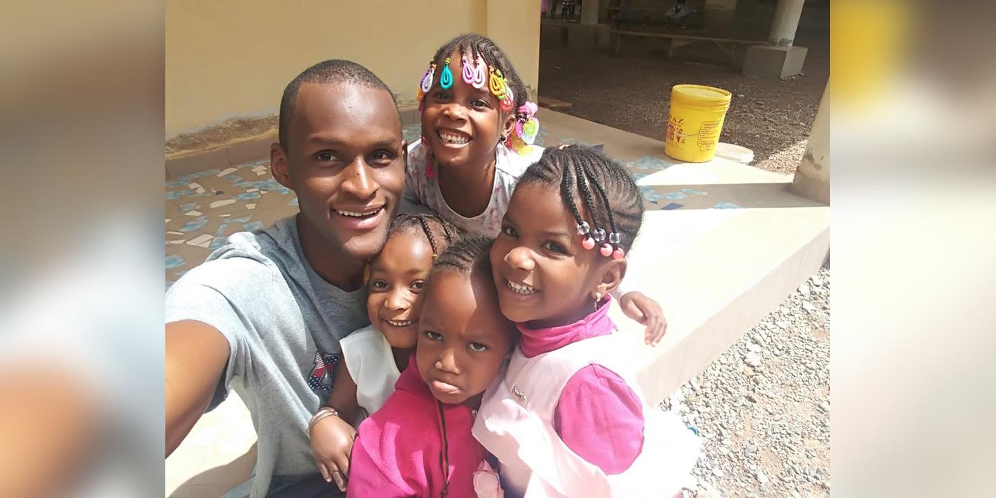 Ahmadou Balde with children in Guinea
