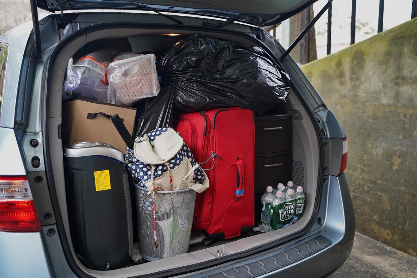 Car with packed trunk on move-in day