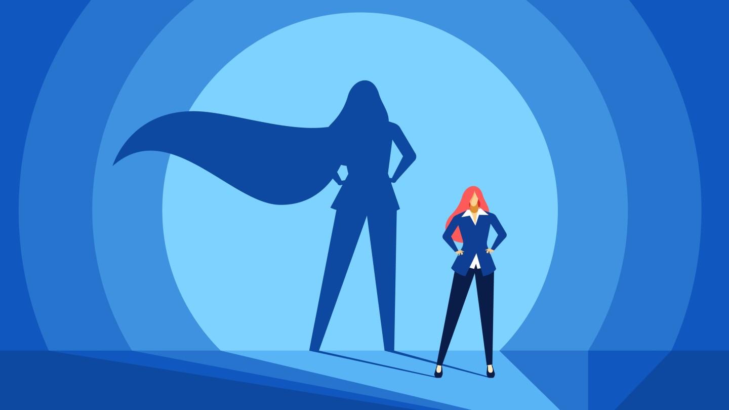 Illustration of female business leader showing her shadow with a cape