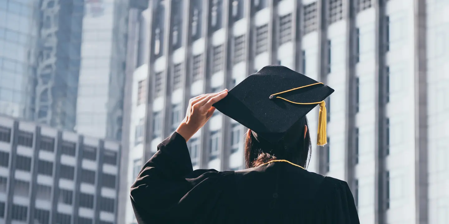 student with graduation cap