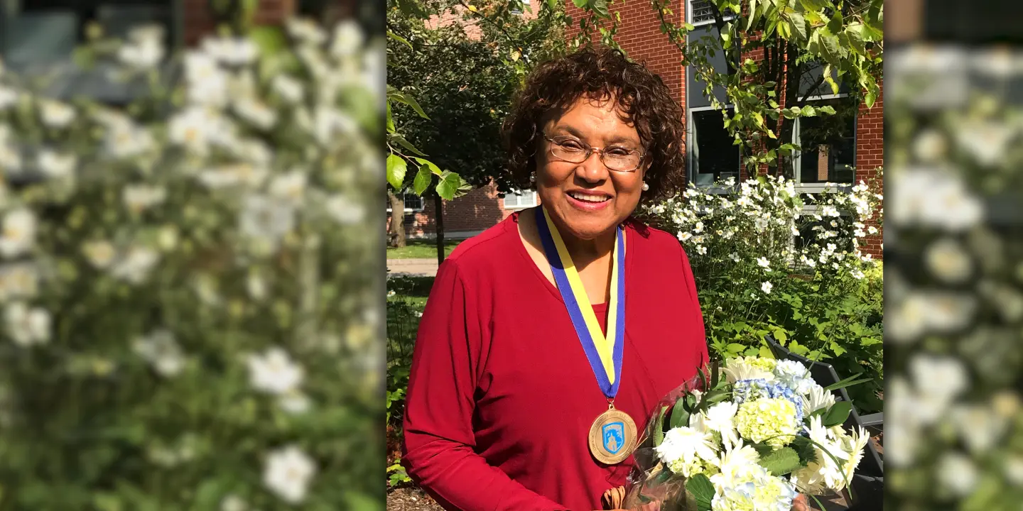 Barbara Paul-Emile with Adamian medal