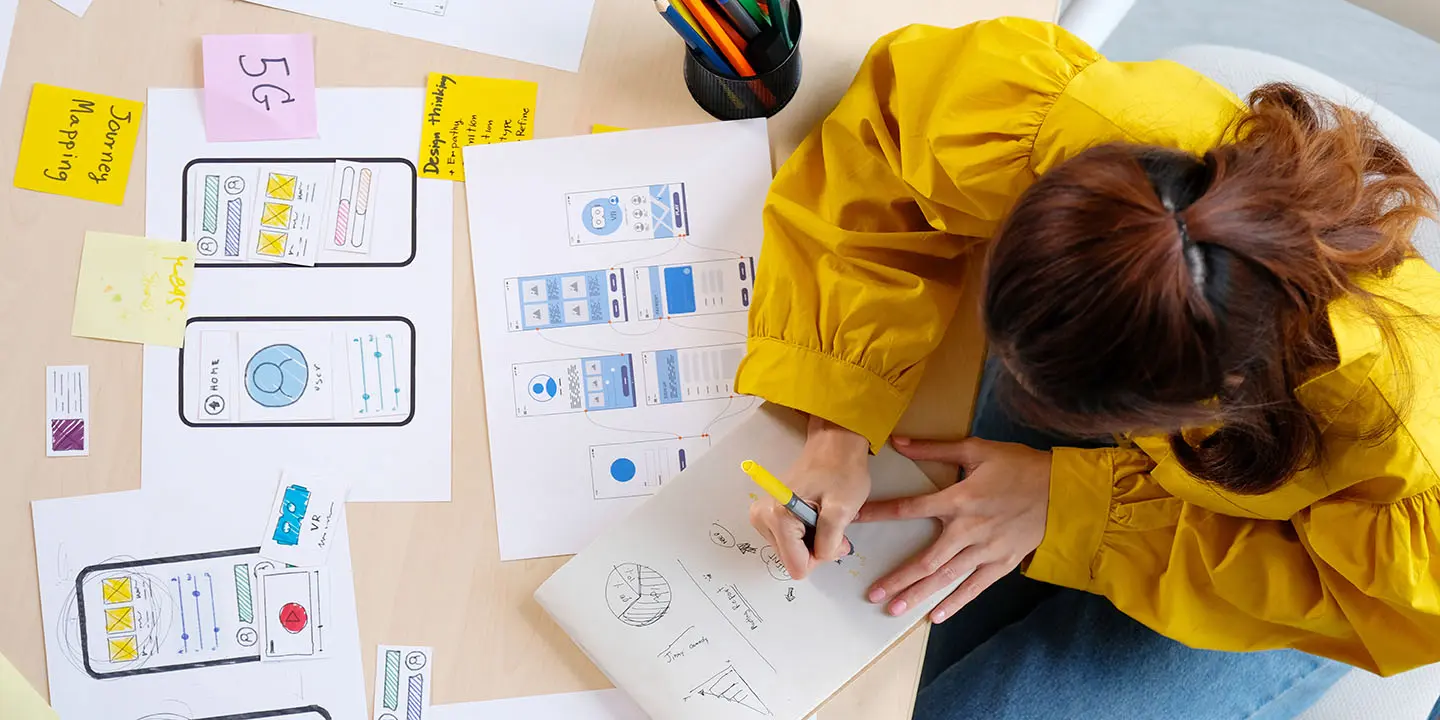 student working on ux design portfolio