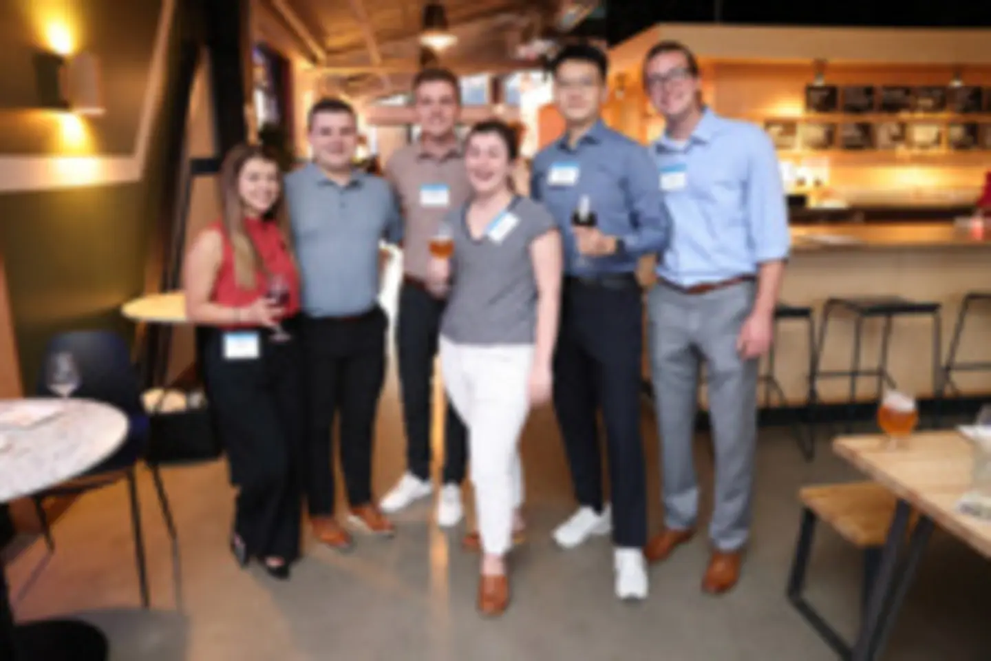 Group of people posing at cafe