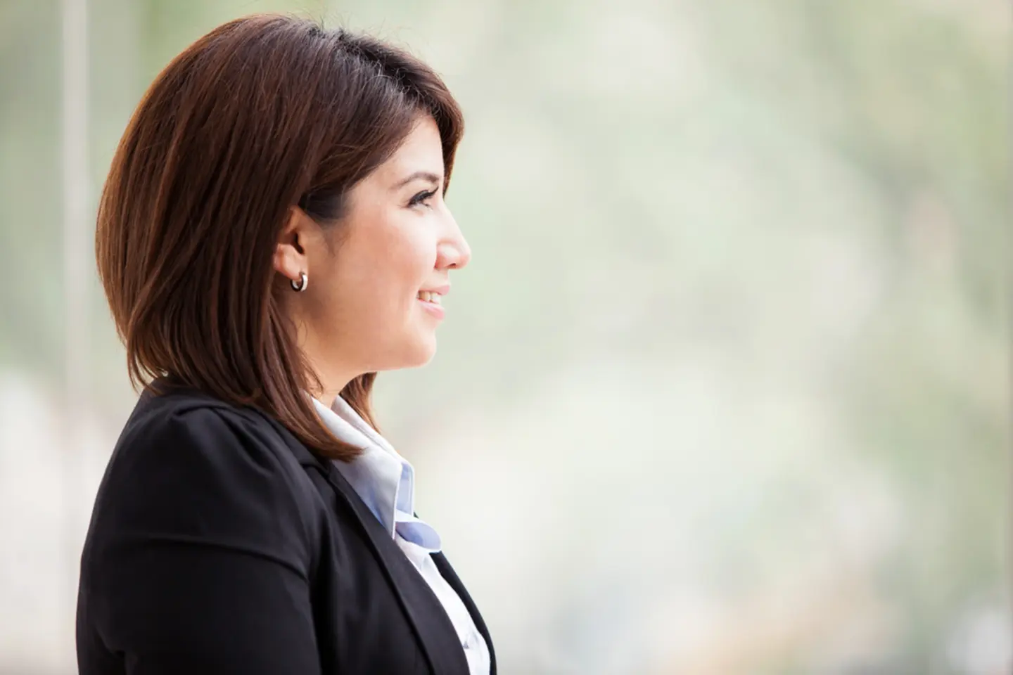 Woman contemplating an executive phd in business versus a dba