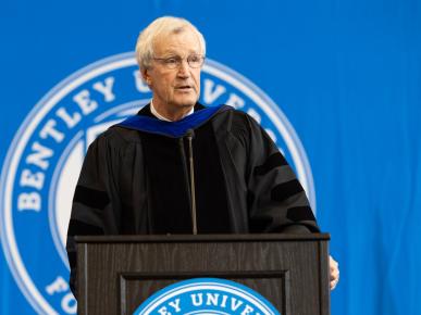 Dr. B. Joseph White stands at the podium to deliver his inauguration remarks