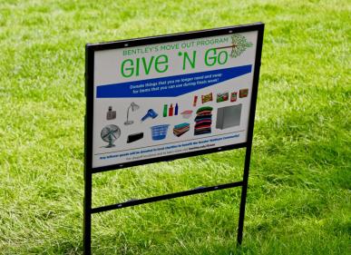 Give N Go sign on grass 