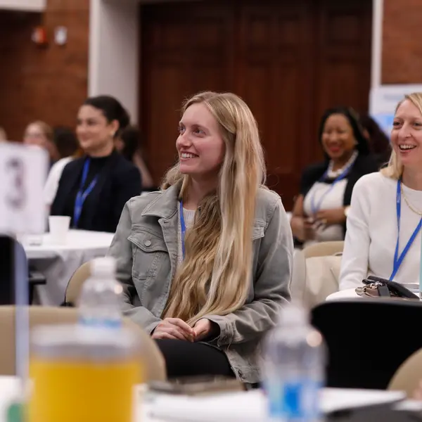 Gearing Up Conference Woman Networking listening to Keynote Speaker
