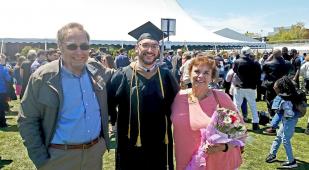 Bentley University graduate Mark Hodgdon with his parents 